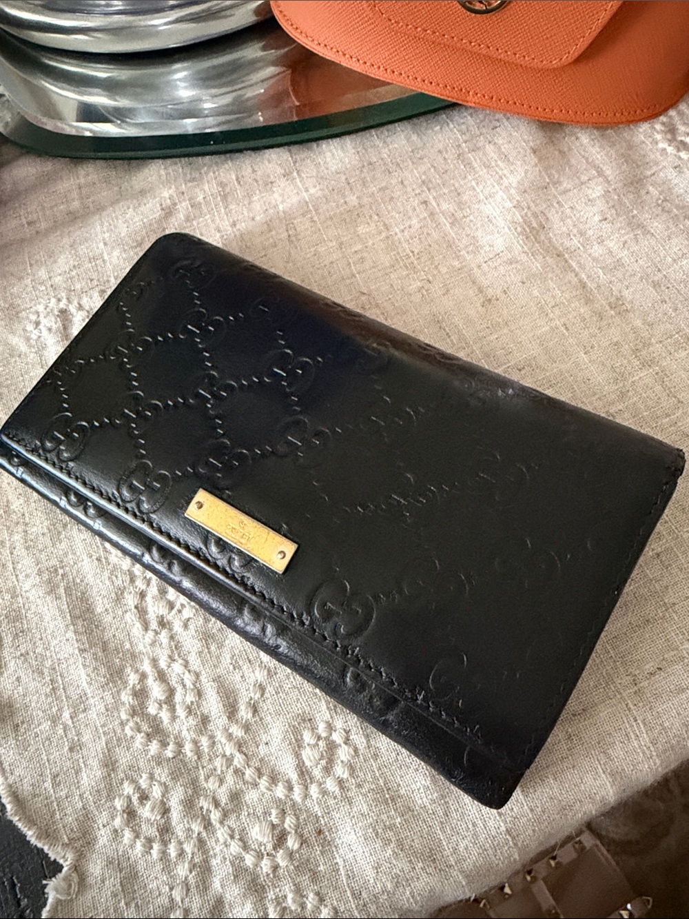 Gucci Black Embossed Leather Wallet with Gold Plaque